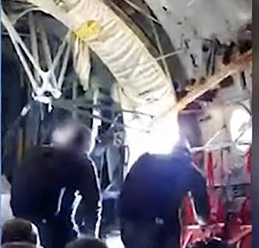 Paraşütü açılmayan Yunan subay uçakta asılı kaldı